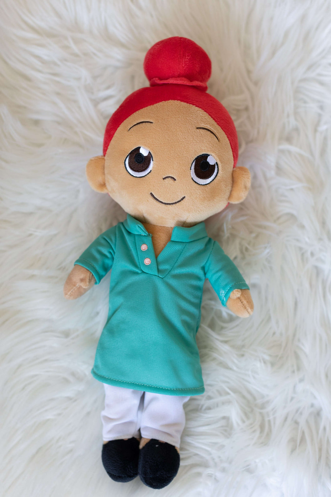 Manu is an Indian, Sikh, Punjabi boy. This plush toy is for children of all ages. 